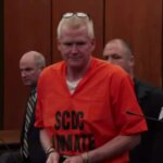 Alex Murdaugh in jumpsuit, cuffs