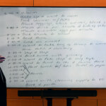 Whiteboard and man