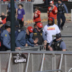 Police stand around barricades