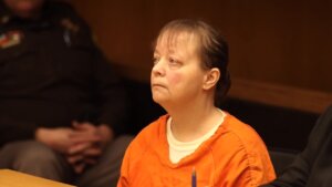Woman accused in fire that killed Michigan butcher appears in court