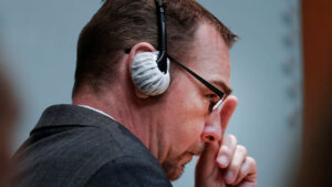 Jury hears frantic 911 call from Michigan school shooter’s dad