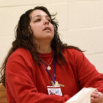 Kayla Montgomery looks up during her parole hearing