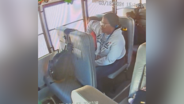 School bus aide seen on video hitting child facing new charges