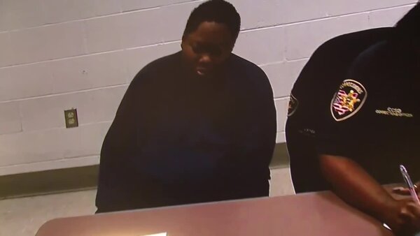 Woman accused of killing 3-year-old in random attack giggles in court
