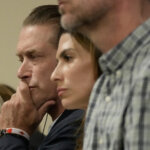 man sits in court