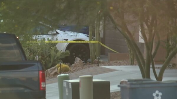 Arizona father charged with murder after daughter dies in hot car