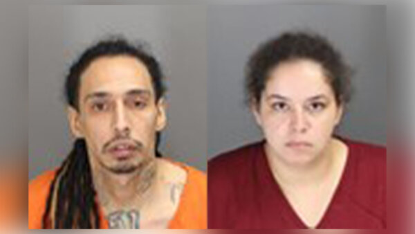 Mom, boyfriend charged in murder of boy confined to pen, stapled to wall