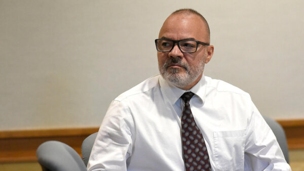 First of 8 men charged in youth detention center abuse scandal on trial