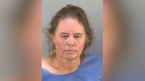 FL woman charged with murder in shootout that killed deputy, her family