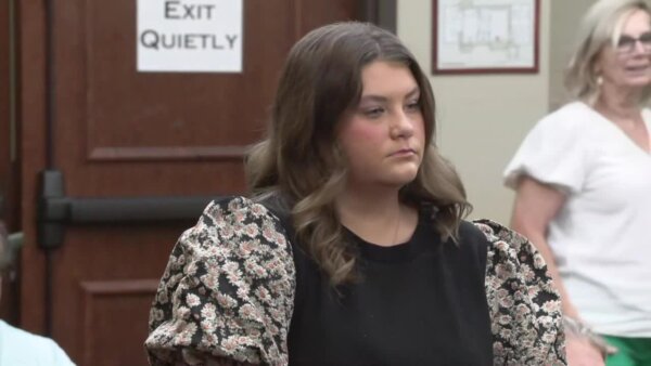 Ex-pageant queen charged in death of boyfriend’s toddler pleads not guilty