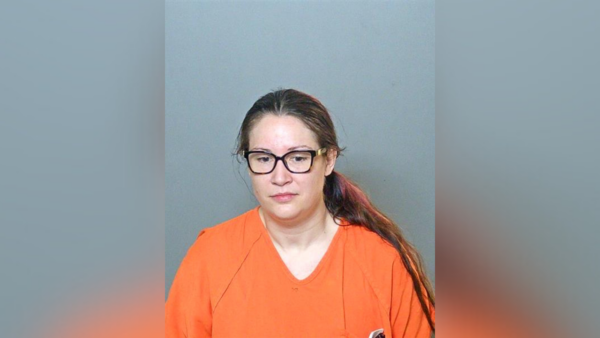 Police: Woman killed boyfriend, kissed him and apologized before leaving