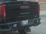 license plate and rear of GMC Sierra truck