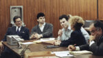 Erik Menendez listens to his attorney Leslie Abramson, as his brother Lyle looks