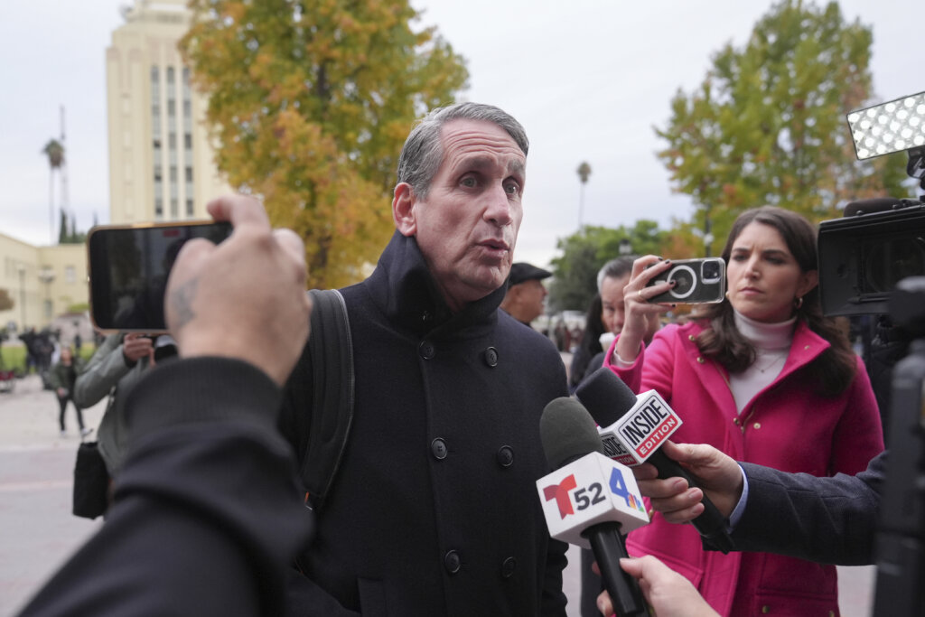 Bryan Freedman, an attorney representing family members of Erik and Lyle Menendez, talks to reporters