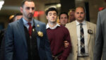 Luigi Mangione walks into court