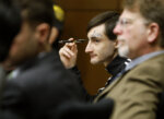Robert E. Crimo, III listens as potential jurors are questioned