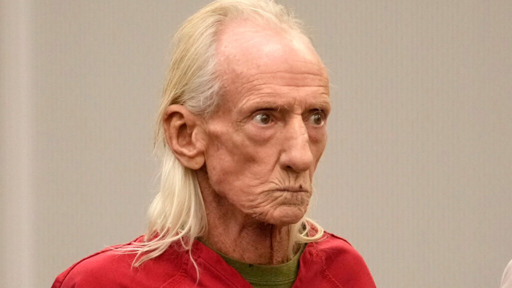 Joseph Czuba, 71, stands before Circuit Judge Dave Carlson for his arraignment at the Will County, Ill., courthouse, Oct. 30, 2023, in Joliet, Ill.