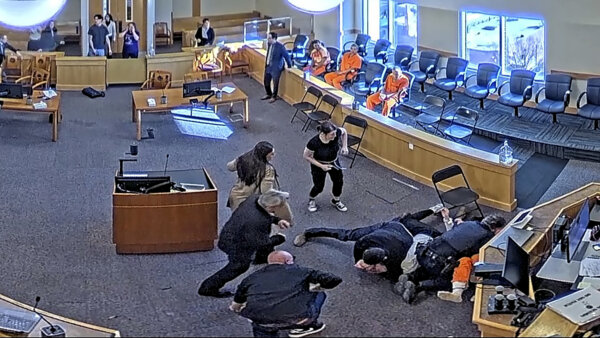 Homicide hearing turns into courtroom brawl in New Mexico