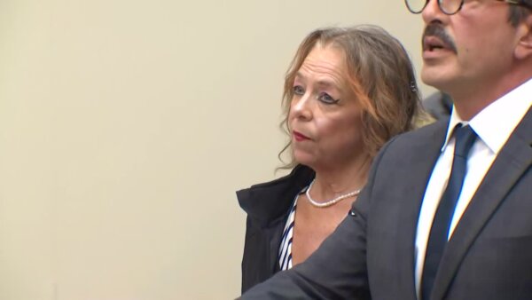Stepmother accused of holding man captive for 20 years due in court