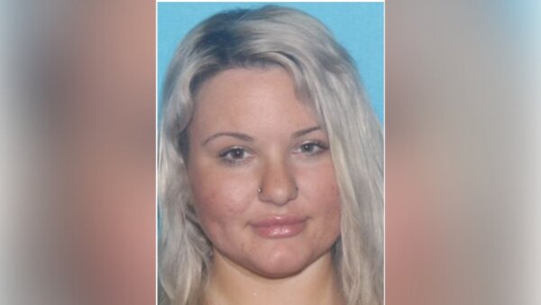 Woman charged in murder-for-hire plot targeting police officer, teen
