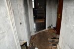 burned hallway with debris