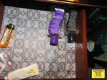 bottles of lubricant inside a beside drawer