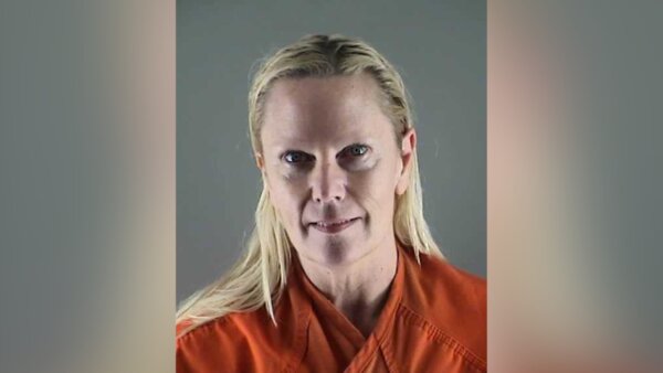Ex-wife charged with murder after body found stuffed in closet