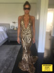 assie Ventura is seen wearing her gown for the premiere of her film "The Perfect Match"
