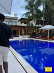 diddy walking by a pool