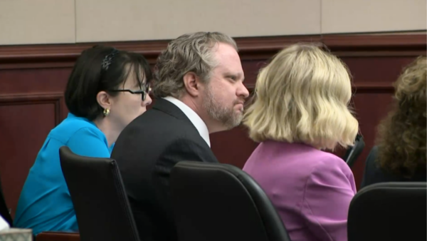 Prosecutor: Dentist poisoned wife with cyanide to be with mistress