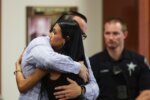 Steve Goncalves, father of victim Kaylee Goncalves hugs his daughter Alivea after speaking at the sentencing hearing of Bryan Kohberger
