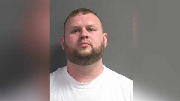 Former officer sentenced for slamming handcuffed DUI suspect