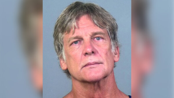 Man accused of trying to kill wife in brutal attack on open water