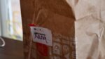 brown bag with label saying 'xana'
