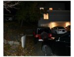 Cars parked outside house