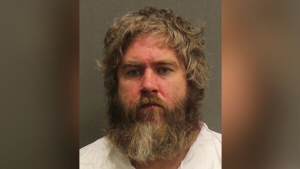 Former attorney charged with strangling girlfriend to death