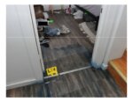 pants on floor, blue processing liquid