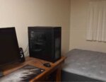 room with mattress and computer