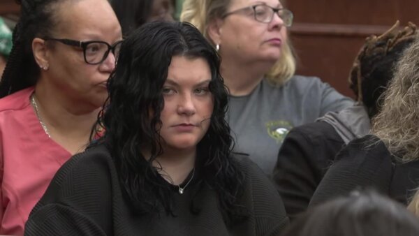 Ex-pageant queen charged in death of boyfriend’s toddler in court
