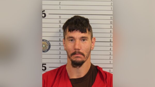 Tenn. man charged with murdering woman by setting her on fire