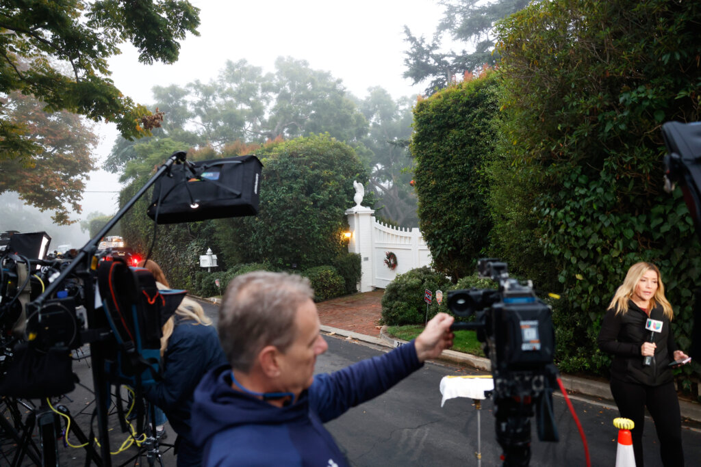 News crews stage outside Rob Reiner's residence