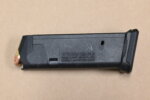 gun magazine and bullet