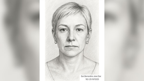 Man charged with murder after estranged wife found down embankment