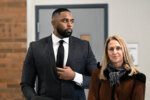 Sherrone Moore, center, appears in the courtroom