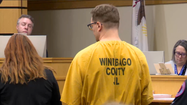 Doctor charged in ex-wife and husband’s murders waives extradition
