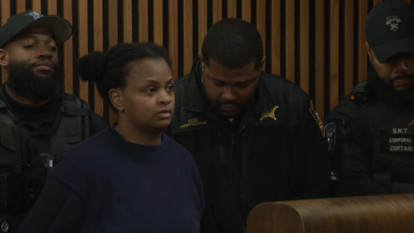 $2 million bond for mother charged after 2 girls found dead in suitcases