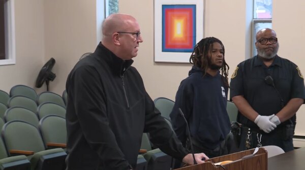 Father charged after toddler found in locked impounded car