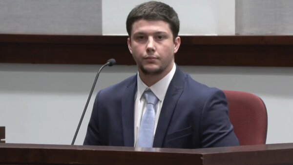 Former MMA fighter Ross Johnson testifies he was helping ‘defenseless’ friend during fatal fight