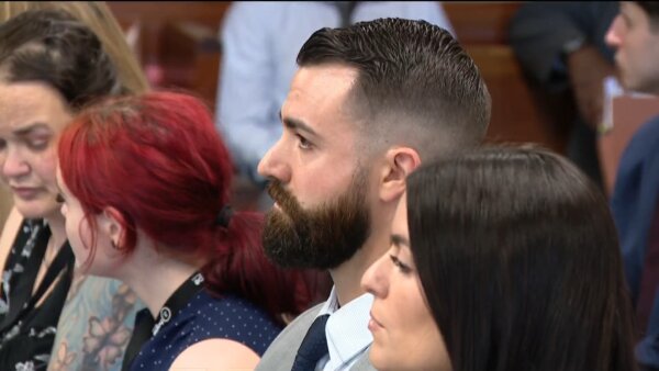 Boston police officer pleads not guilty in killing of carjacking suspect