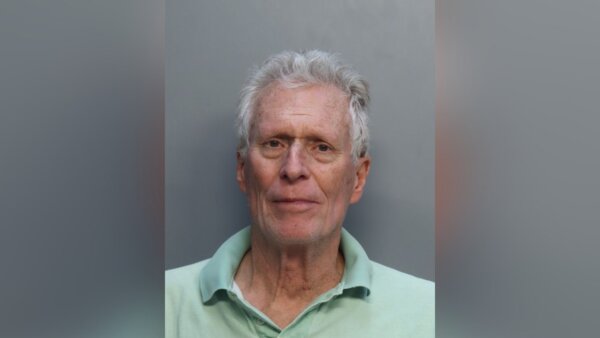 Man charged with murder after allegedly pushing woman on public sidewalk